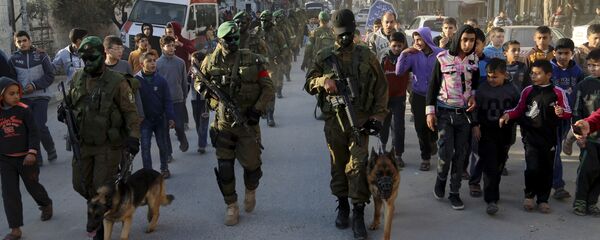 كتائب عزالدين القسام، الجناح العسكري التابع لحركة حماس في قطاع غزة، فلسطين 19 يناير/ كانون الثاني 2017 كتائب عزالدين القسام، الجناح العسكري التابع لحركة حماس في قطاع غزة، فلسطين 19 يناير/ كانون الثاني 2017 - سبوتنيك عربي