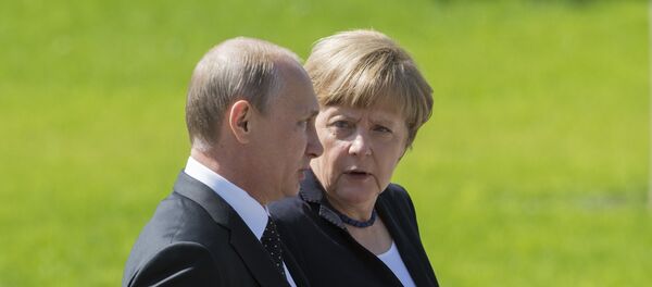 بوتين وميركل - سبوتنيك عربي