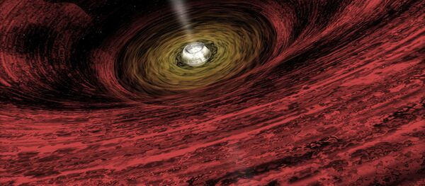 رسم توضيحي لفنان حول تزايد حجم الثقب الأسود في أوائل مراحله، وتدور حوله حلقات ضخمة من الغاز الذي يبتله الثقب - سبوتنيك عربي