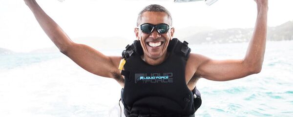 الرئيس الأمريكي السابق باراك أوباما خلال قضاء عطلته في جزر فيرجين، 7 فبراير/ شباط 2017 - سبوتنيك عربي