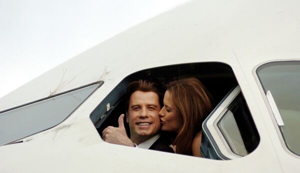 الممثل الأمريكي جون ترافولتا وزوجته كيلي بريستون - سبوتنيك عربي