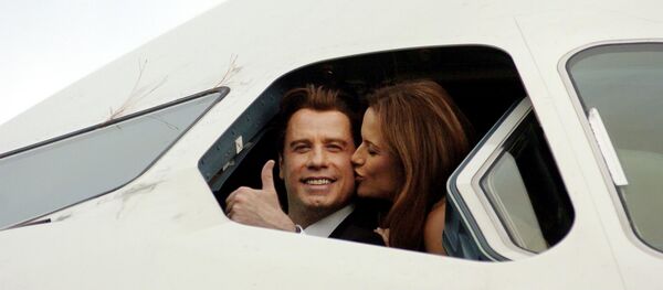 الممثل الأمريكي جون ترافولتا وزوجته كيلي بريستون - سبوتنيك عربي