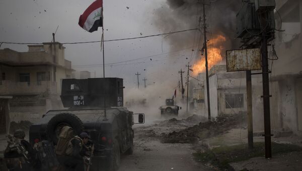 جائزة صورة الصحافة العالمية لعام 2017 (World Press Photo 2017) - فئة تغطية إخبارية للحدث - اسم الصورة المعركة من أجل الموصل !   (Battle For Mosul) - المرتبة الثالثة  للمصور فيليبي دانا - سبوتنيك عربي