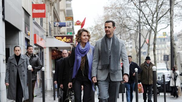 الرئيس السوري بشار الأسد برفقة زوجته أسماء الأسد - سبوتنيك عربي