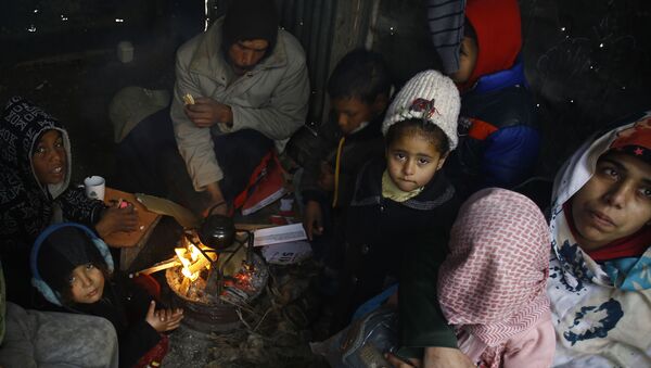 Альт: أمطار غزيرة انهالت على مخيم جباليا للاجئين، قطاع غزة، فلسطين 16 فبراير/ شباط 2017 - سبوتنيك عربي