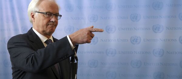 ممثل روسيا الدائم لدى الأمم المتحدة فيتالي تشوركين يتحدث إلى الصحفيين بعد اجتماع غير رسمي لمجلس الأمن حول مناقشة الوضع في سوريا، نيويورك، 26 يوليو/ تموز 2013 - سبوتنيك عربي