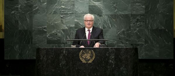 ممثل روسيا الدائم لدى الأمم المتحدة فيتالي تشوركين بمقر الأمم المتحدة، 13 أكتوبر/ تشرين الأول 2013 - سبوتنيك عربي