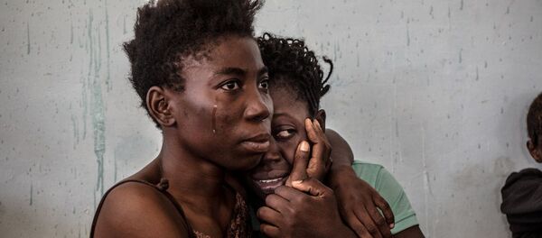 صورة عن الاعتداء الجنسي فازت بجائزة الصحافة العالمية 2017 - سبوتنيك عربي