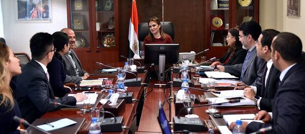 د.سحر نصر  مع وفد البنك الصناعي والتجاري الصينى - سبوتنيك عربي