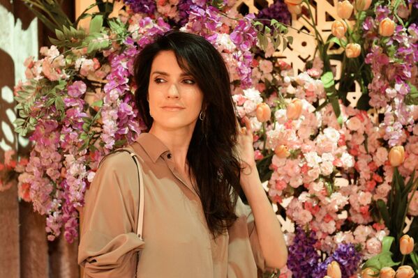 ضيوف خلال عرض أزياء لدار الأزياء فردوس (Firdaws) في مدينة غروزني يوم أمس الأربعاء، 2 مارس/ آذار 2017 - سبوتنيك عربي