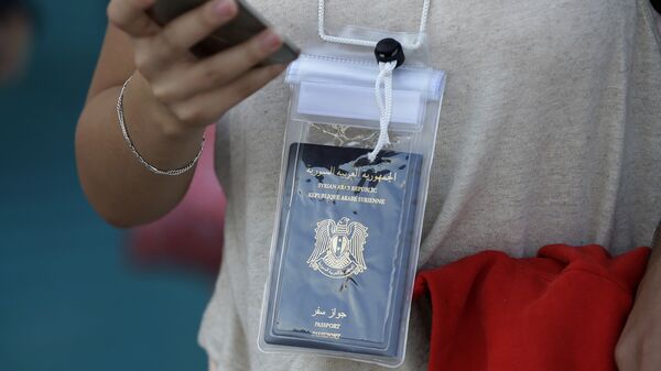 جواز سفر سوري - سبوتنيك عربي