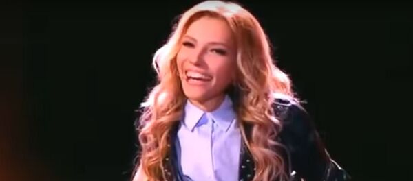 مطربة روسية على كرسي متحرك تشارك في يوروفيجين 2017 مطربة روسية على كرسي متحرك تشارك في يوروفيجين 2017 - سبوتنيك عربي