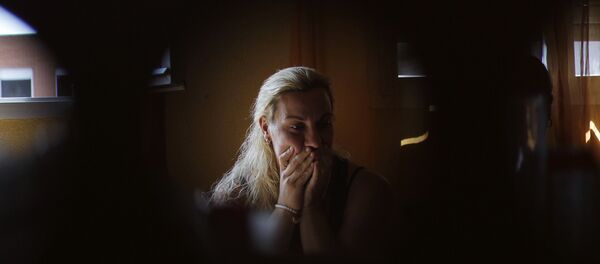 إحدى ضحايا العنف في إسبانيا - سبوتنيك عربي