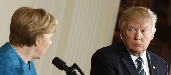 ميركل وترامب - سبوتنيك عربي