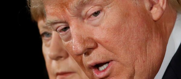 ميركل وترامب - سبوتنيك عربي