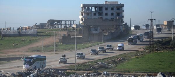 إخلاء السملحين السوريين وعائلاتهم من حمص، سوريا 19 مارس/ آذار 2017 - سبوتنيك عربي