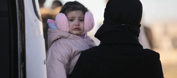 إخلاء السملحين السوريين وعائلاتهم من حمص، سوريا 19 مارس/ آذار 2017 - سبوتنيك عربي