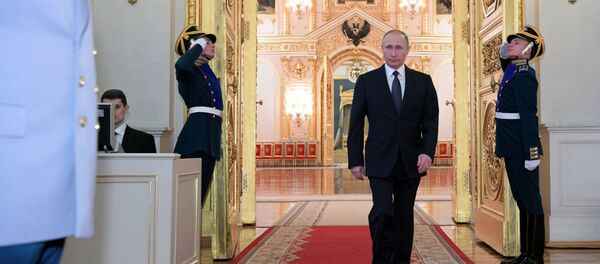 الرئيس فلاديمير بوتين خلال مراسم تعيين الضباط الروس لمناصب علية - سبوتنيك عربي