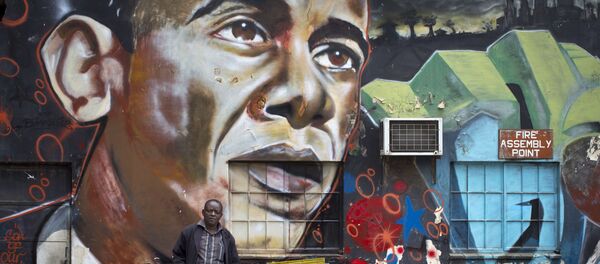 رسم غرافيتي للرئيس الأمريكي السابق باراك أوباما في نايبوري، كينيا رسم غرافيتي للرئيس الأمريكي السابق باراك أوباما في نايبوري، كينيا - سبوتنيك عربي