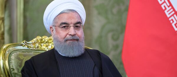 الرئيس الروسي فلاديمير بوتين مع نظيره الإيراني حسن روحاني - سبوتنيك عربي