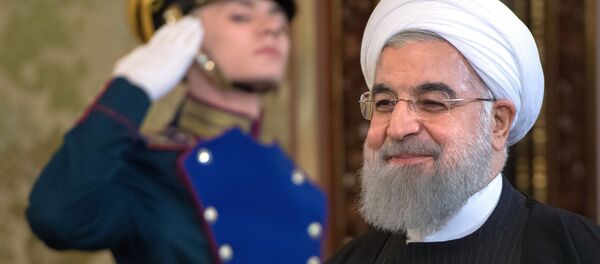 الرئيس الروسي فلاديمير بوتين مع نظيره الإيراني حسن روحاني - سبوتنيك عربي