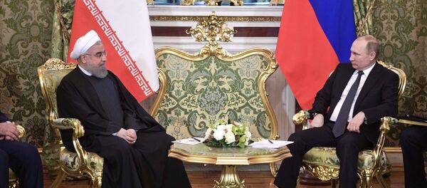 الرئيس الروسي فلاديمير بوتين مع نظيره الإيراني حسن روحاني - سبوتنيك عربي