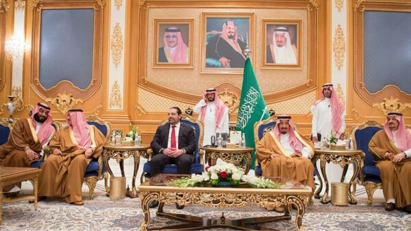 الملك السعودي ورئيس الحكومة اللبنانية سعد الحريري - سبوتنيك عربي