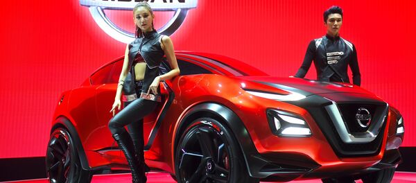 عارضات كوريات تقدّمن سيارة نيسان الجديدة Nissan Gripz  خلال معرض للسيارات Seoul Motor Show  في سيئول، كوريا الجنوبية 30 مارس/ آذار 2017 - سبوتنيك عربي