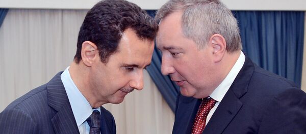 روغوزين و الأسد روغوزين و الأسد - سبوتنيك عربي