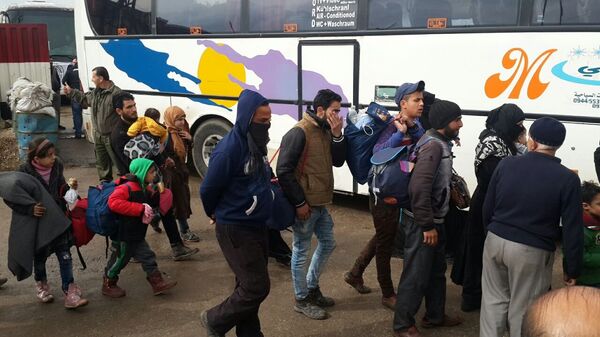 خروج المسلحين من حمص باتجاه جرابلس - سبوتنيك عربي