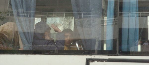 خروج المسلحين من حي الوعر - سبوتنيك عربي