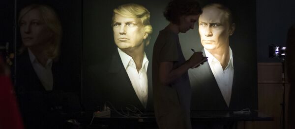 صورتا بوتين وترامب - سبوتنيك عربي