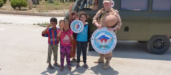 المراقبين الروس لخروج الدفعة الخامسة من مسلحي الوعر - سبوتنيك عربي