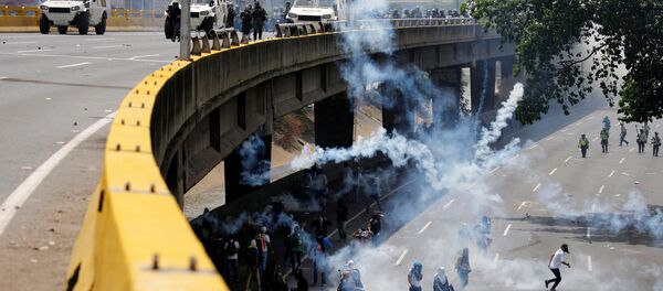 احتجاجات ومظاهرات مناهضة لحكومة فنزويلا في كاراكاس، 19 أبريل/ نيسان 2017 - سبوتنيك عربي