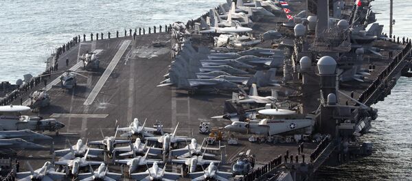 حاملة الطائرات الأمريكية كارل فيجين المتواجدة حالياً في ميناء بوسان، كوريا الجنوبية 15 مارس/ آذار 2017 - سبوتنيك عربي