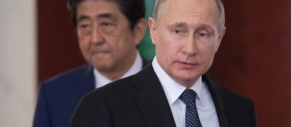 بوتين وآبي بوتين وآبي - سبوتنيك عربي