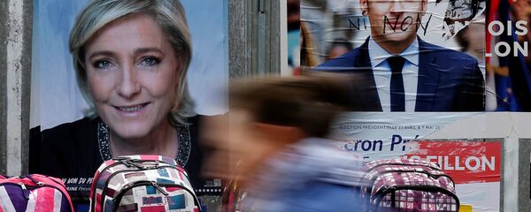 لوبان وماكرون لوبان وماكرون - سبوتنيك عربي