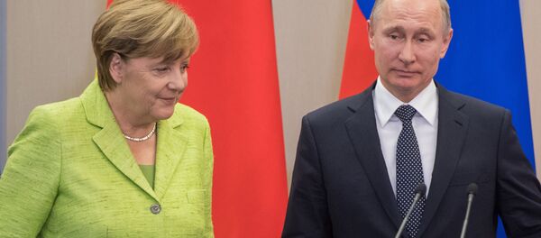 لقاء الرئيس الروسي فلايديمير بوتين والمستشارة الألمانية أنجيلا ميركل - سبوتنيك عربي