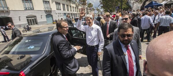 حراس شخصيون بجوار وزير الخارجية الأمريكي السابق جون كيري - سبوتنيك عربي