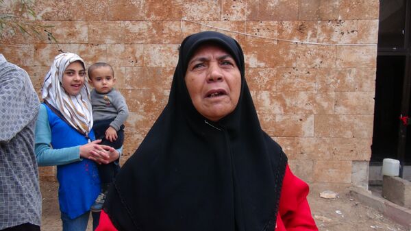 أهالي الشهداء من المهجرين - سبوتنيك عربي