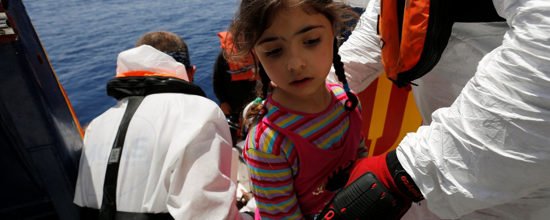 إغاثة طفلة من قارب هجرة قبالة مالطا - سبوتنيك عربي, 1920, 20.12.2021