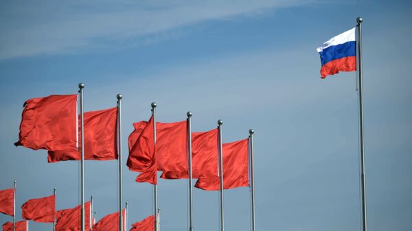 علم روسيا و الصين - سبوتنيك عربي