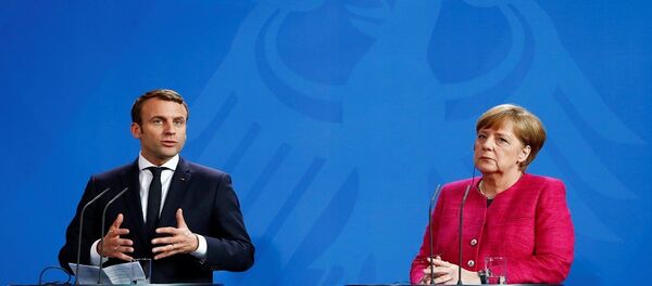 ميركل وماكرون - سبوتنيك عربي