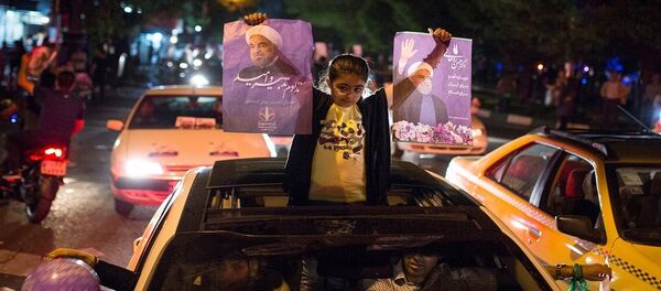 فوز جسن روحاني - سبوتنيك عربي