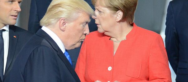 ترامب و ميركل - سبوتنيك عربي