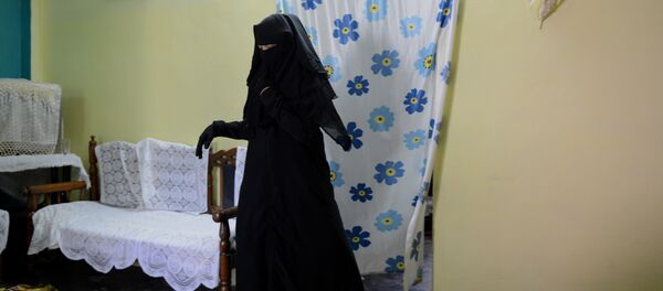 In this photograph taken on April 28, 2016, Shaista Ali, 26, at her house in Bhopal. Only three words were scrawled on the letter from her husband and posted to her parent's home in central India, but they were enough to shatter Sadaf Mehmood's life. Using an ancient and controversial Islamic practice, Mehmood's husband wrote talaq, talaq, talaq or I divorce you three times in Arabic, instantly ending his marriage of five years In this photograph taken on April 28, 2016, Shaista Ali, 26, at her house in Bhopal. Only three words were scrawled on the letter from her husband and posted to her parent's home in central India, but they were enough to shatter Sadaf Mehmood's life. Using an ancient and controversial Islamic practice, Mehmood's husband wrote talaq, talaq, talaq or I divorce you three times in Arabic, instantly ending his marriage of five years - سبوتنيك عربي