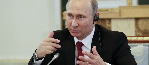 الرئيس بوتين خلال مؤتمر بطرسبورغ - سبوتنيك عربي