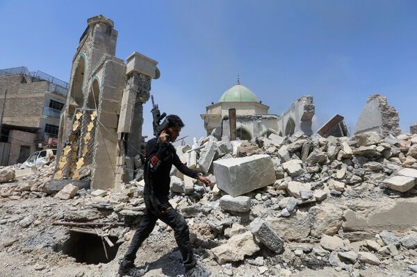 تدمير شبه كامل لمسجد النوري بالموصل تدمير شبه كامل لمسجد النوري بالموصل - سبوتنيك عربي