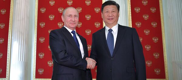 الرئيس الروسي فلاديمير بوتين مع الرئيس الصيني شي جين بينغ - سبوتنيك عربي