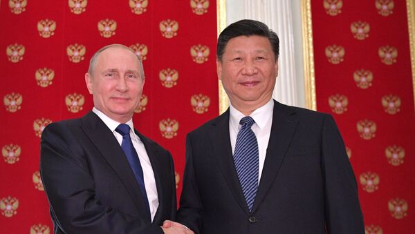 الرئيس الروسي فلاديمير بوتين مع الرئيس الصيني شي جين بينغ - سبوتنيك عربي